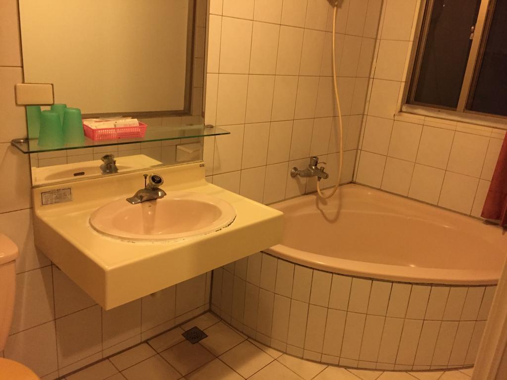 Bazhong Sentosa Hotel Kaohsiung Bagian luar foto